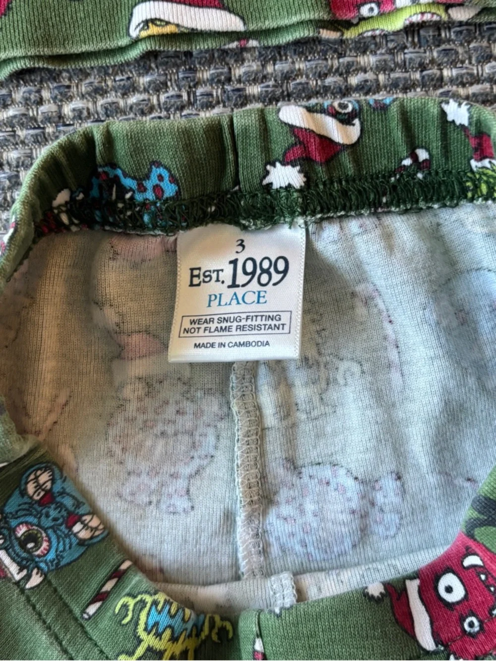 The Children's Place Green Monster Holiday Pajama Set with Red Trim